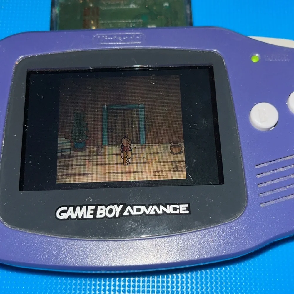 GAME BOY ADVANCE. PURPLE. BATTERY COVER MISSING. POOH GAME included